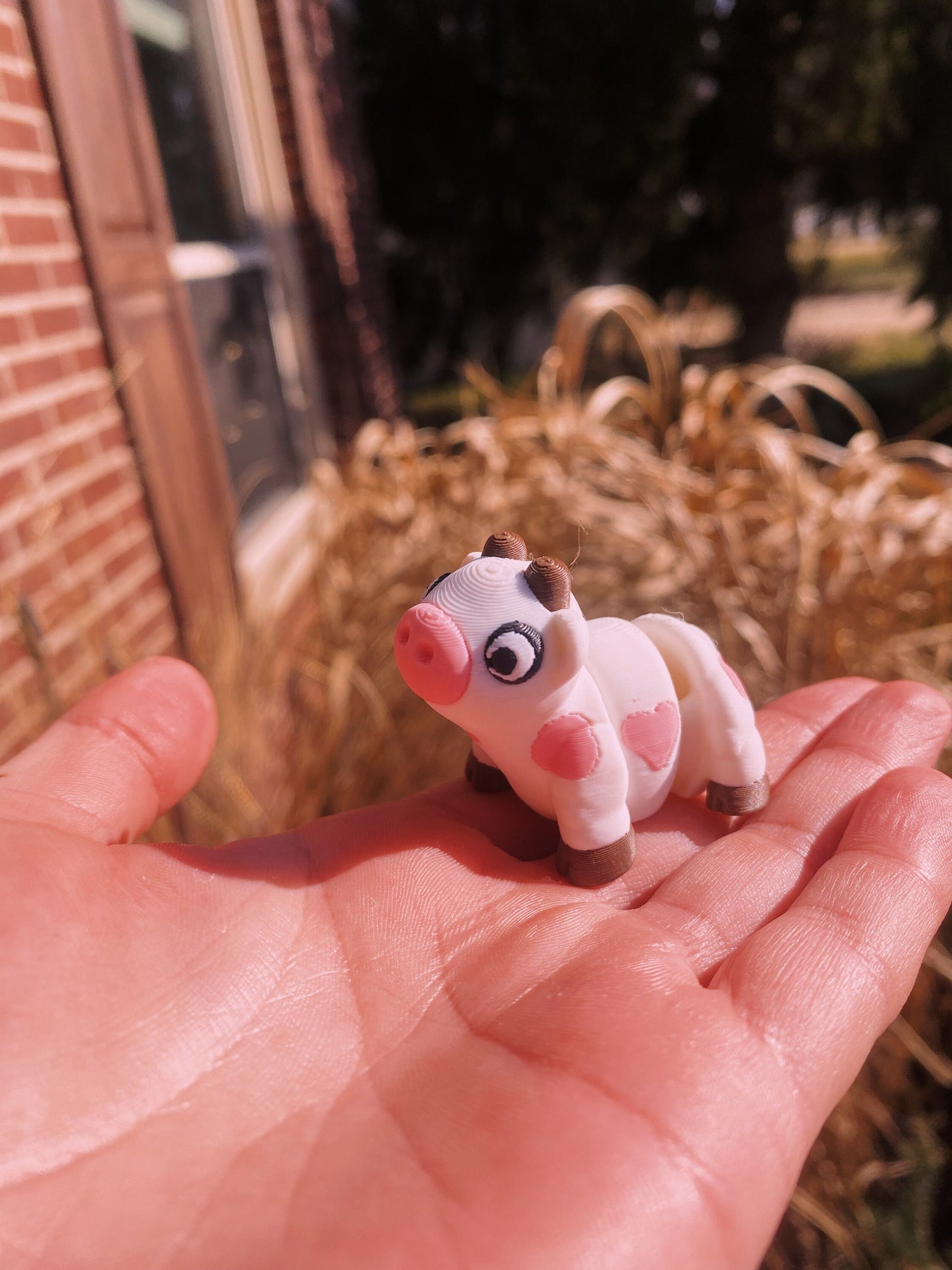 3D Printed Articulated Fidget Cows And Strawberry Cows