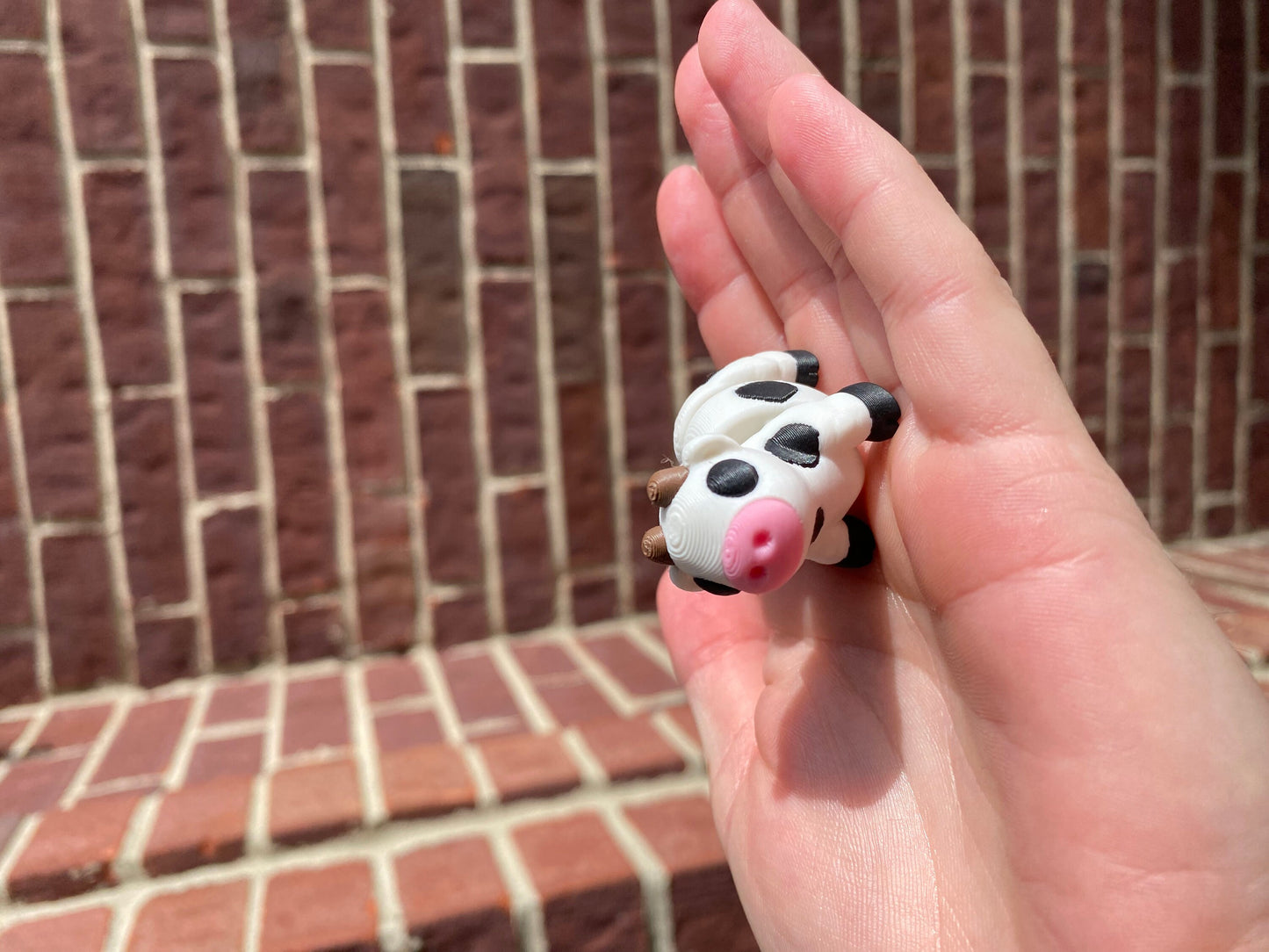 3D Printed Articulated Fidget Cows And Strawberry Cows