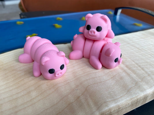 3D Printed Articulated Fidget Pigs And Keychains